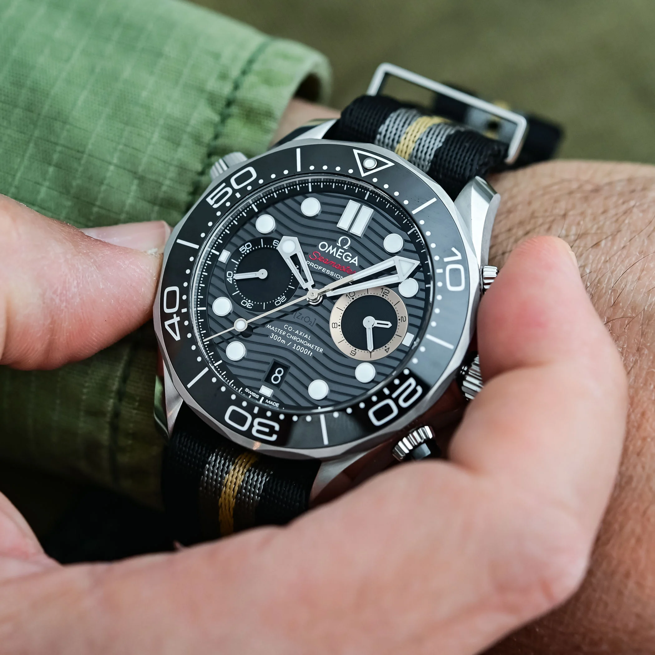 Omega Seamaster 007 First Light — dial detail, PVD bronze-gold accents