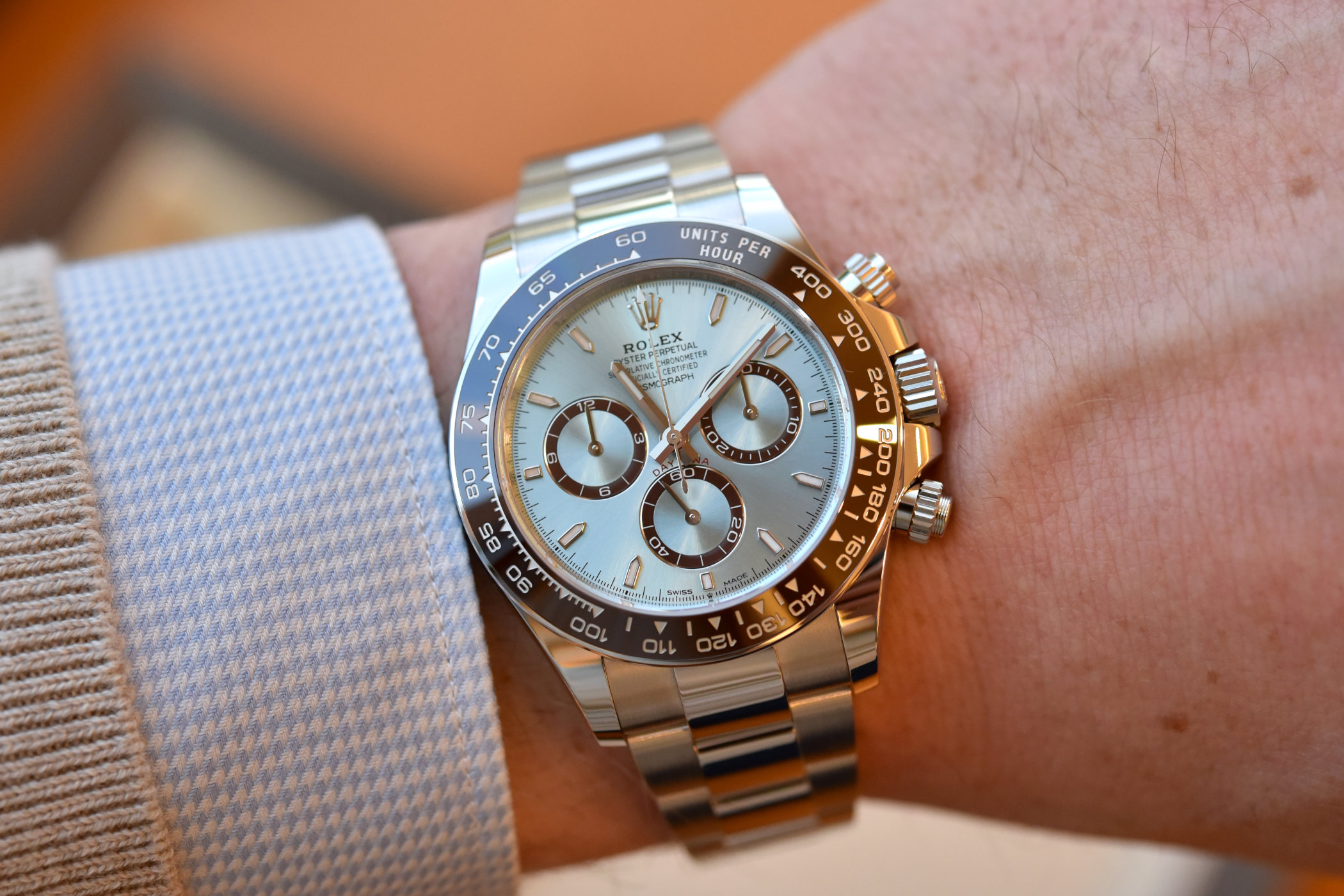 Rolex Daytona 126506 platinum with ice-blue dial and chestnut ceramic bezel on the wrist